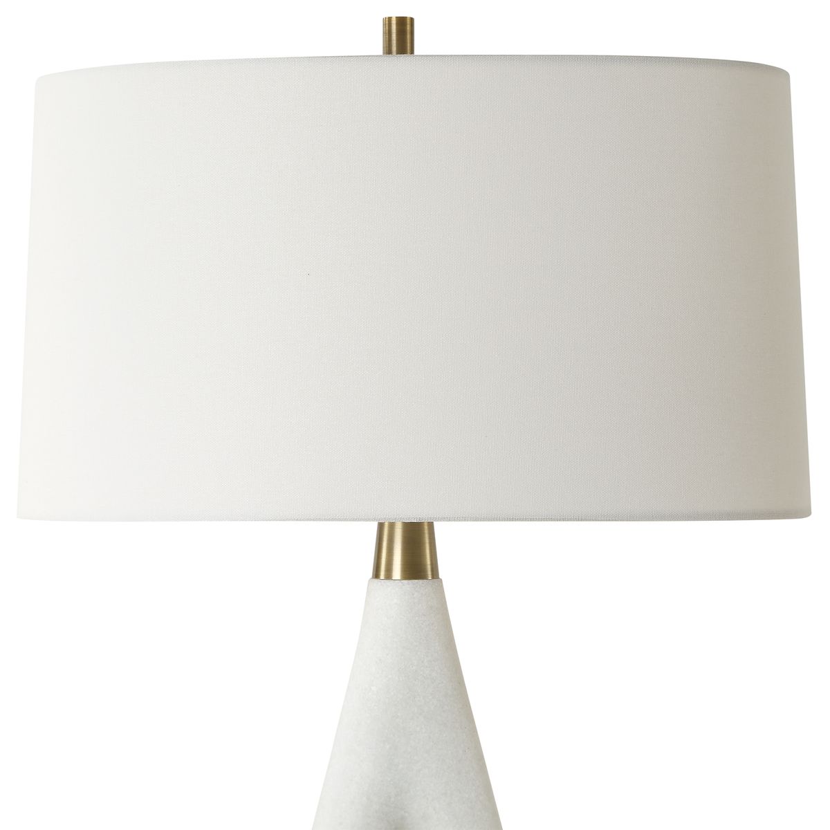 White lamp with a gold base on a white background