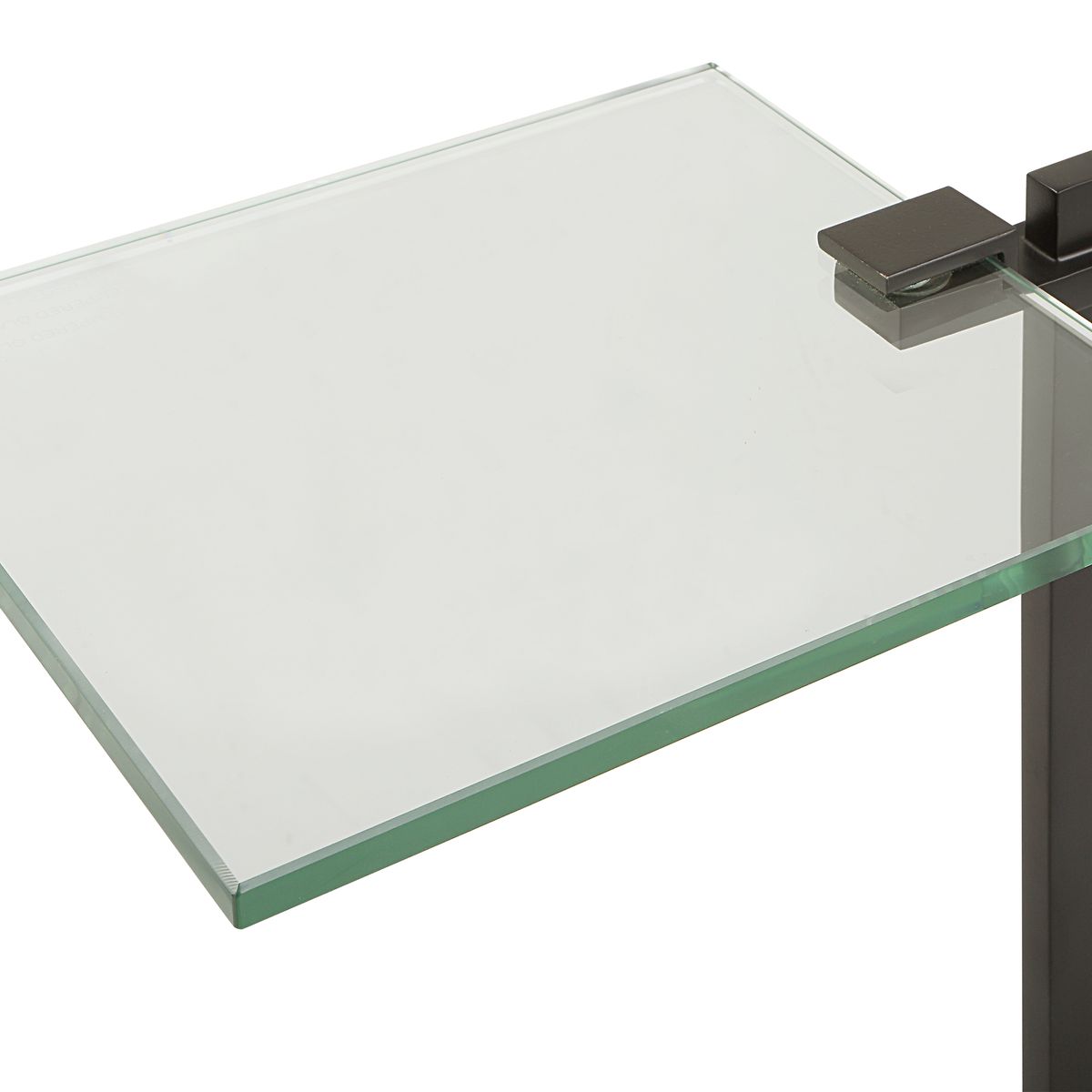 Glass table corner with metal leg on a white background