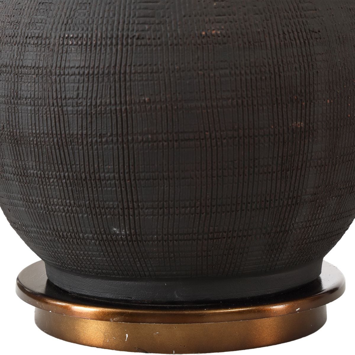 Black ceramic base of lamp.