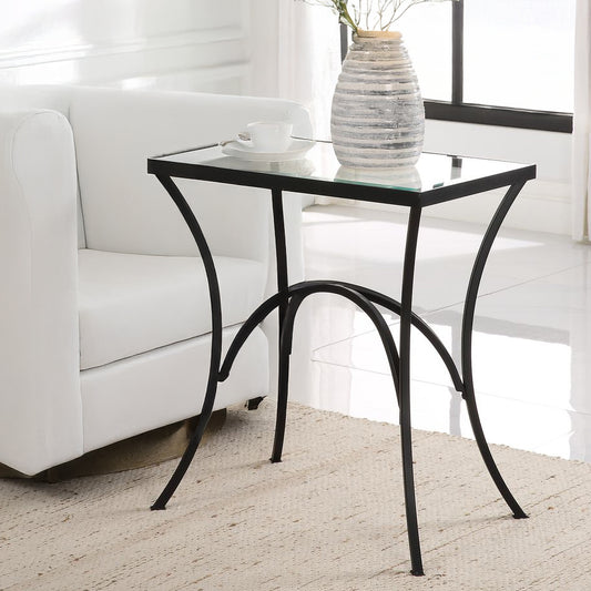 Straigh on black glass table accent.