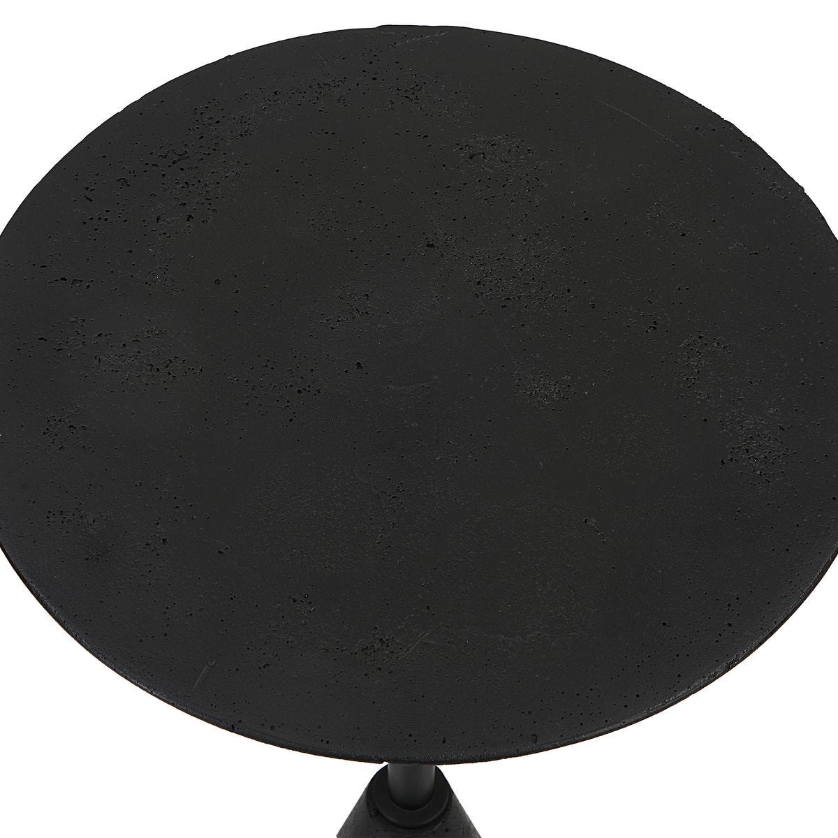 Round black object on a white background