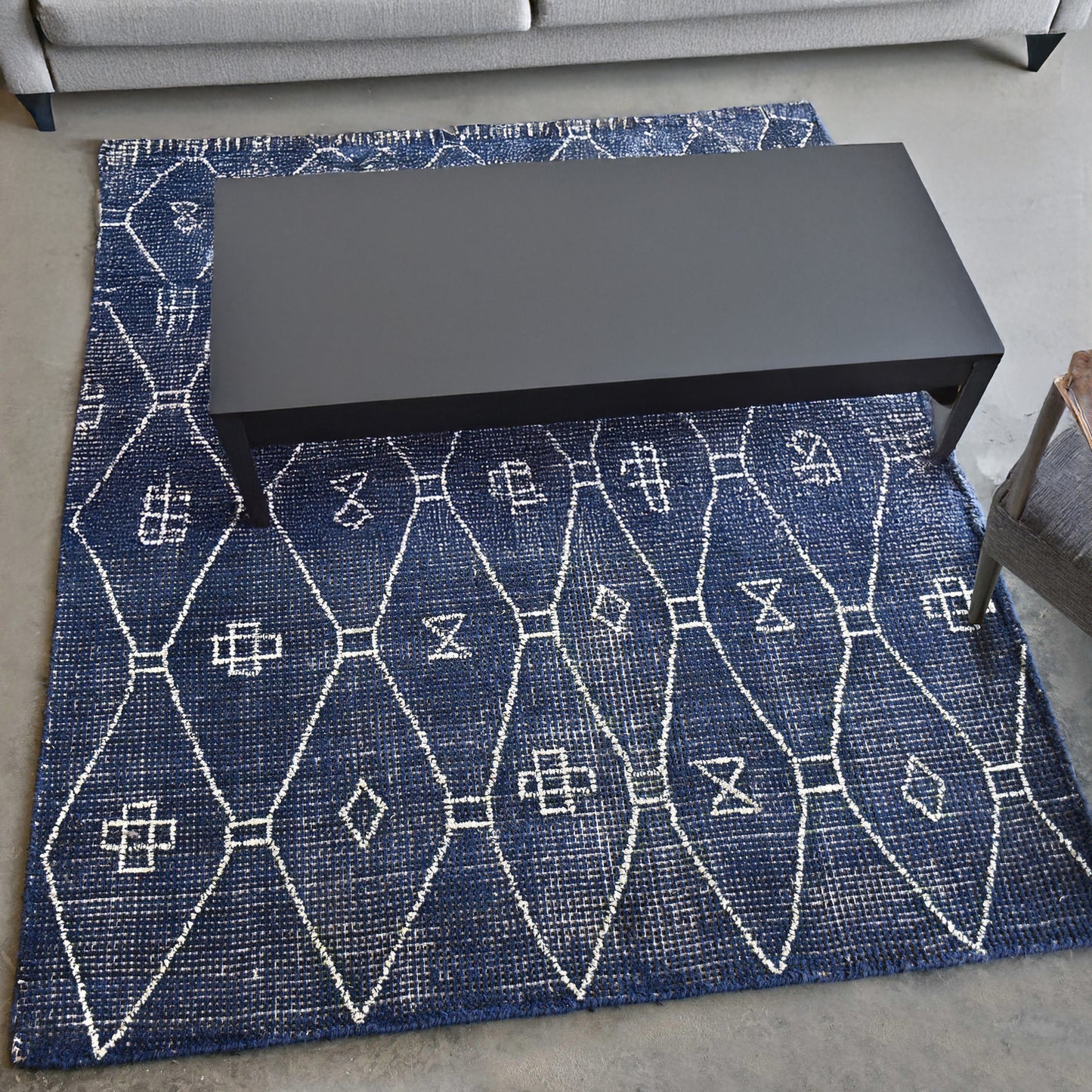 Blue and white geometric rug.