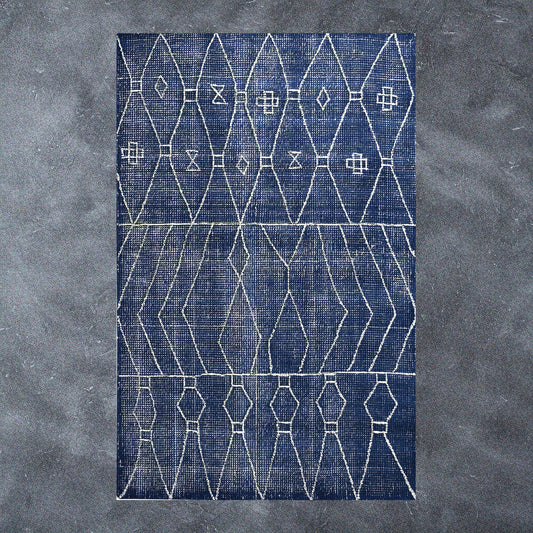 Blue and white geometric rug.