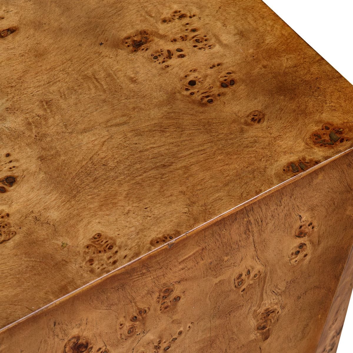 Close-up of a wooden surface with natural grain and burl patterns