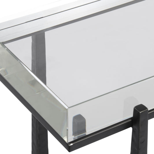Crystal side table in a dark entry.