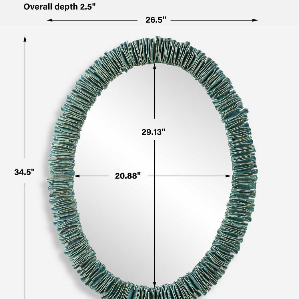 Oval mirror with textured green frame and dimensions on a white background