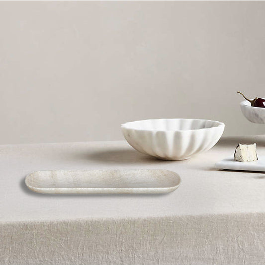Long, narrow marble tray on a white background