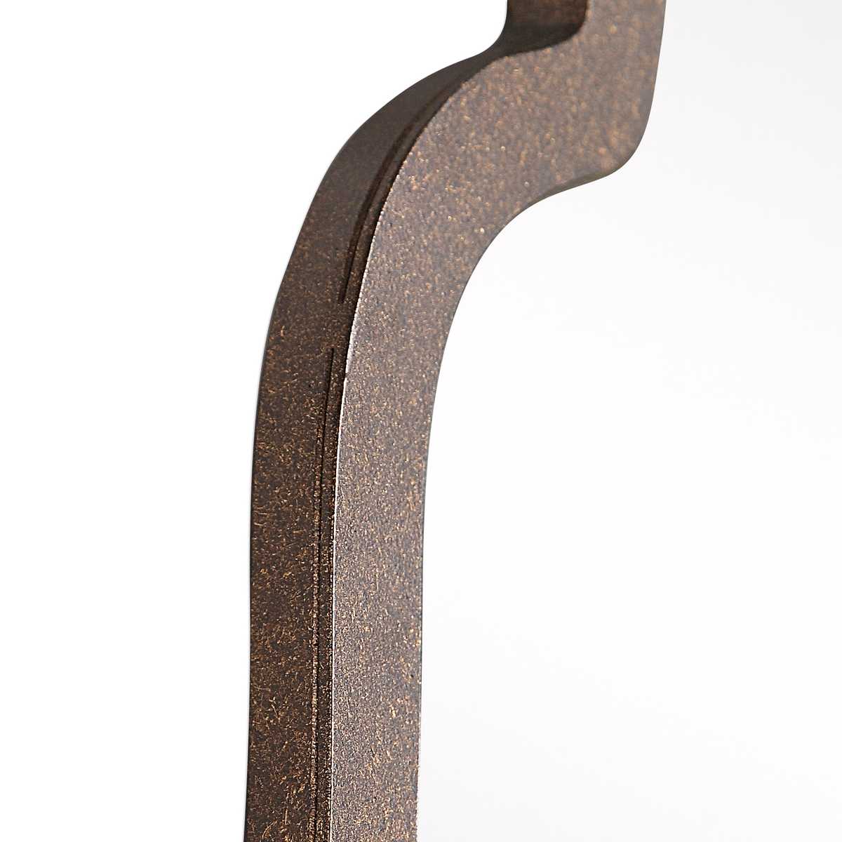 Close-up of a metal bracket with a textured surface on a white background