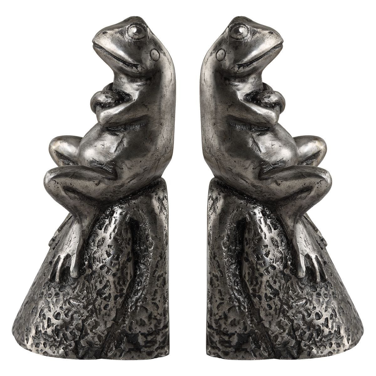 Pair of silver frog figurines on a white background