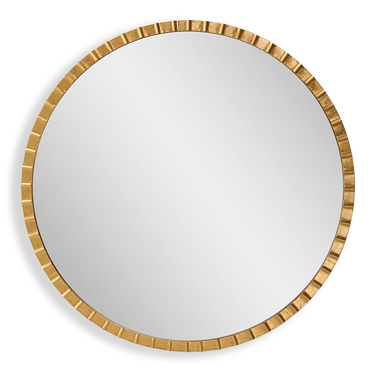Round mirror with a gold frame on a white background