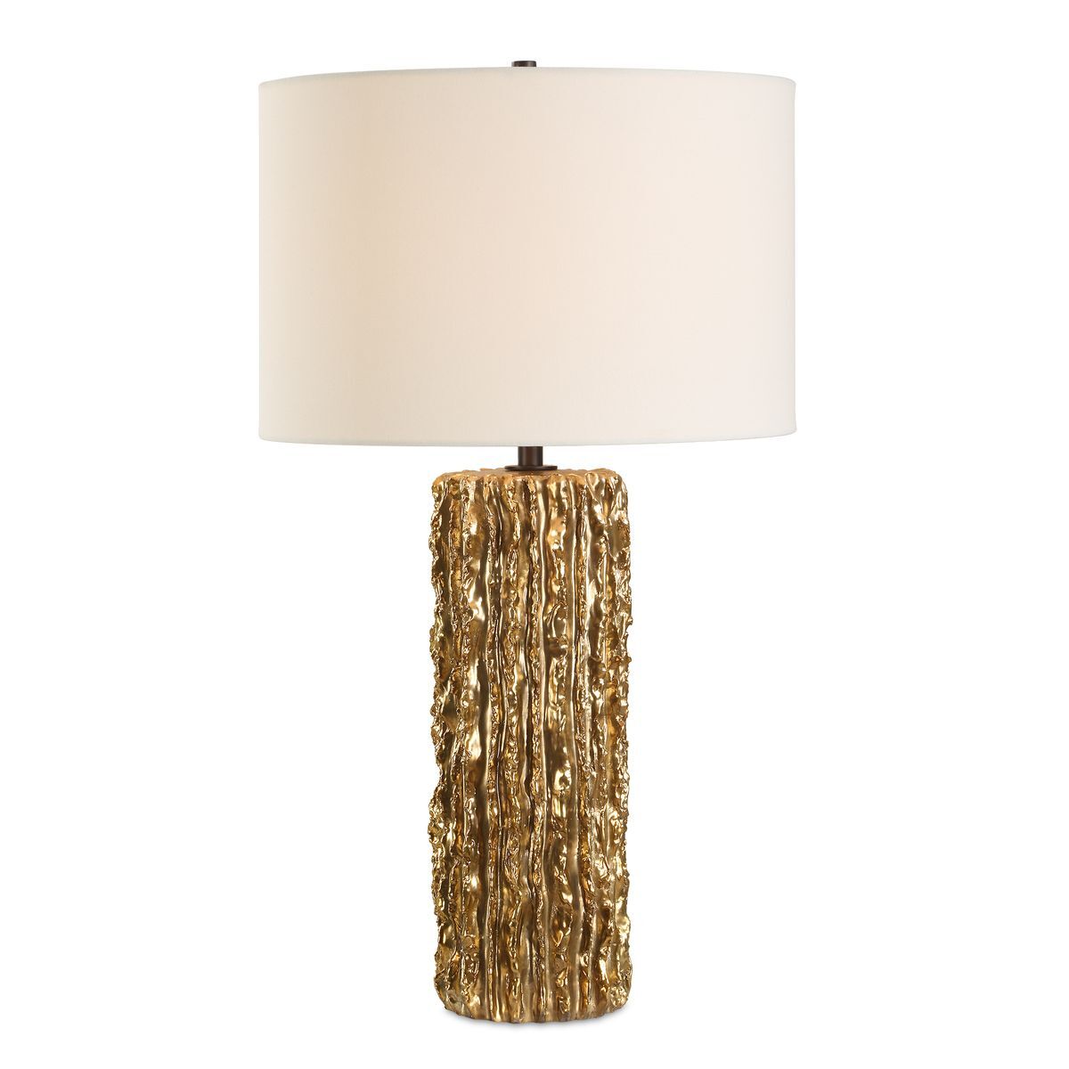 Table lamp with textured gold base and white shade on a white background