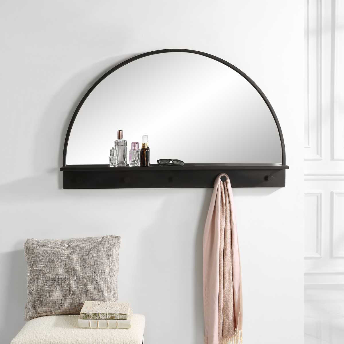 Entryway mirror with hooks.