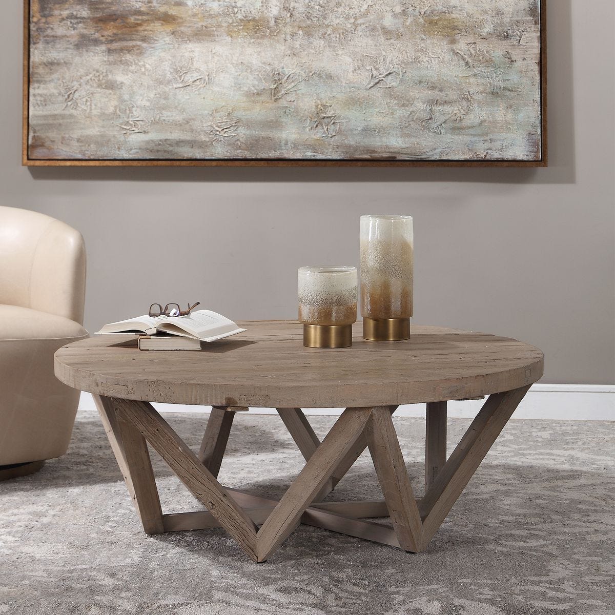 Wooden coffee table with decorative items in a living room setting