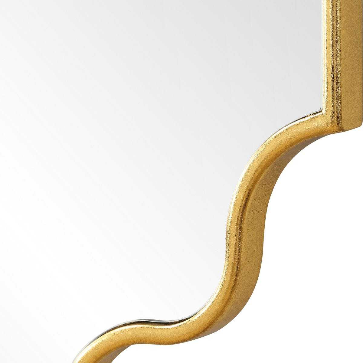 Close-up of a gold metallic object on a white background