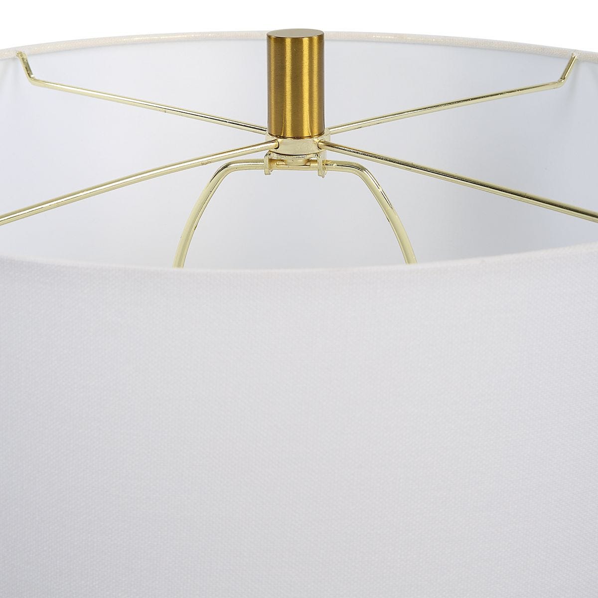 Close-up of a gold umbrella handle with a white background