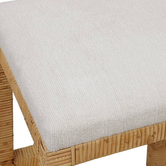 This Coastal Rattan Counter Stool has an Off-White Fabric and Antique Gold Kick Plate.