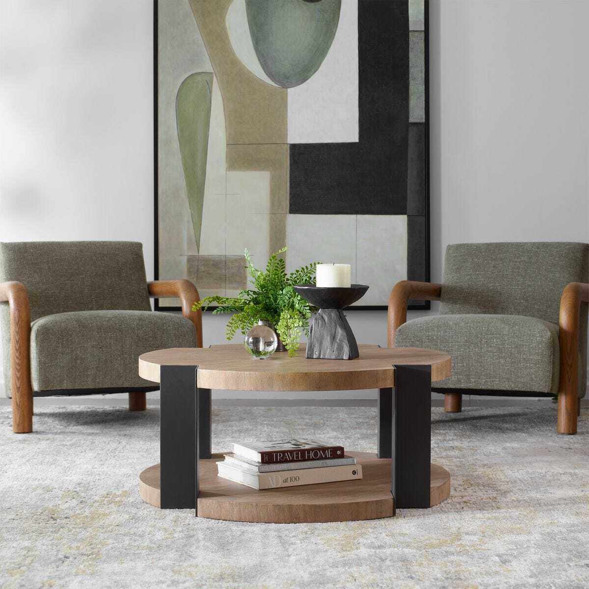 Modern living room with two armchairs and a coffee table.