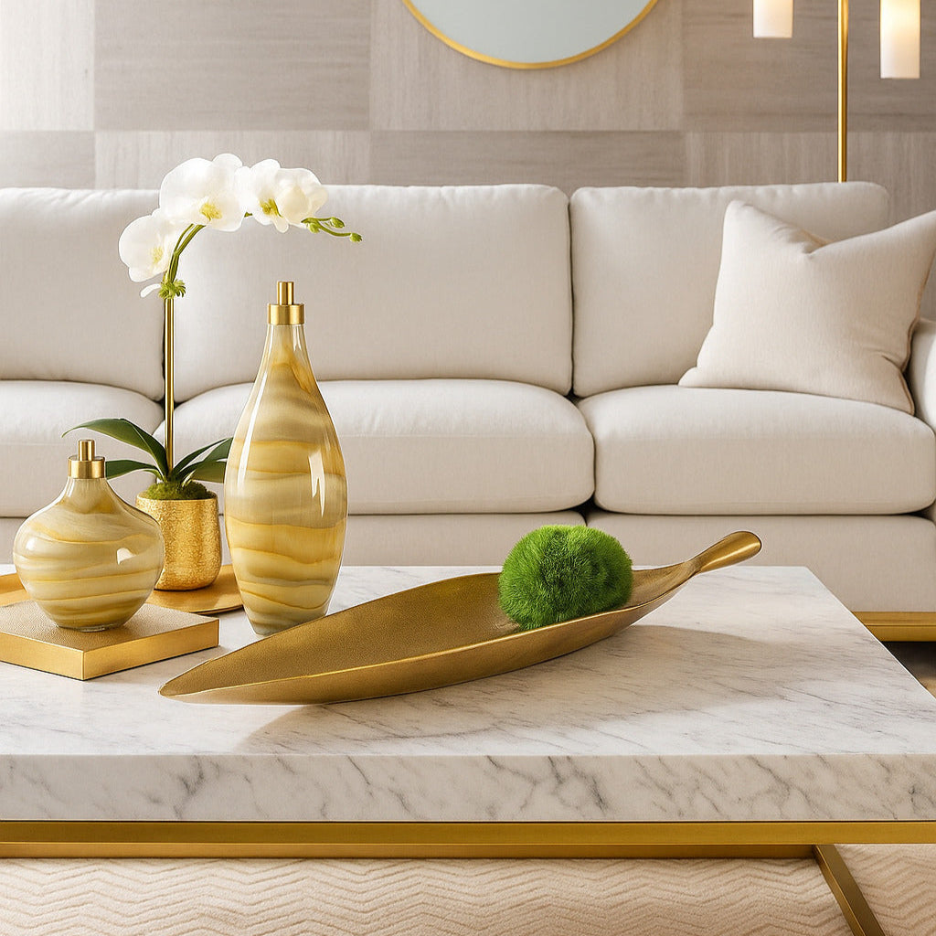 Long gold coffee table tray with moss ball.
