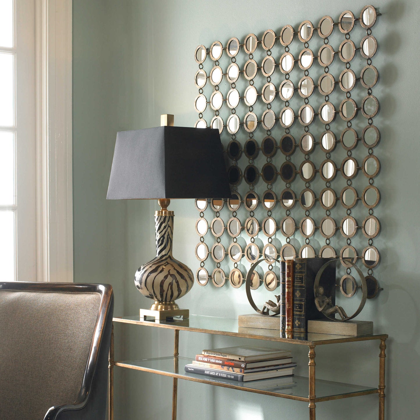 Mirrored Art on Blue Wall.