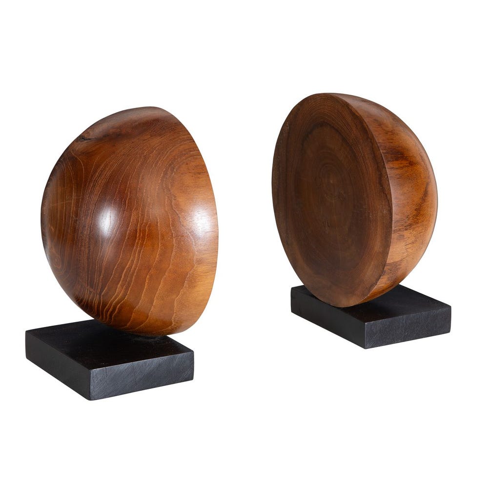 Two wooden bowls on black stands against a white background