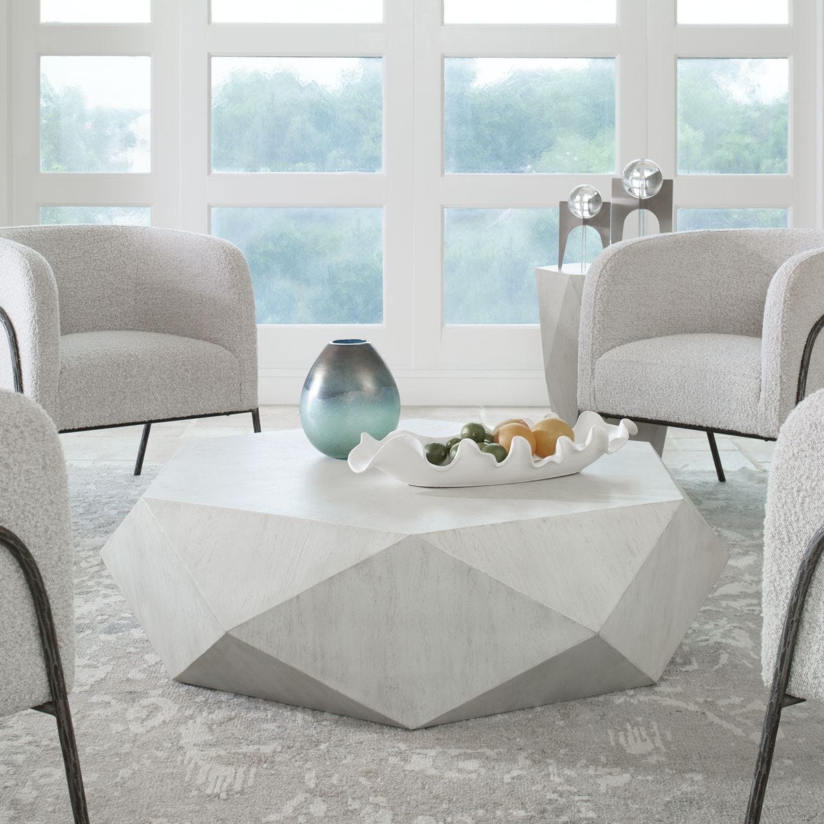 Modern white coffee table in coastal living room with tray.