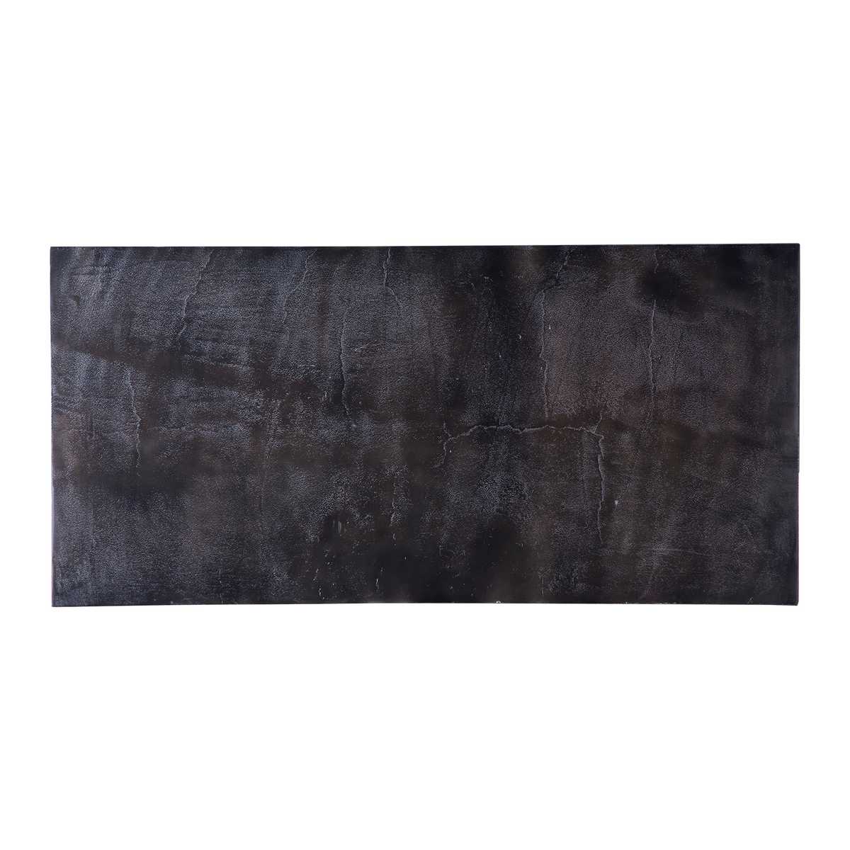Narrow black console table surface.