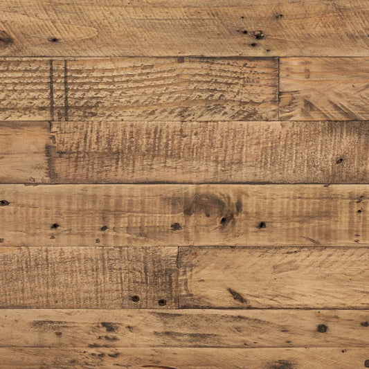 Reclaimed wood bench on carpet with an abstract piece of art with white lines hung on the wall behind it.