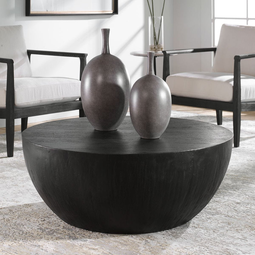 Round mango wood coffee table.