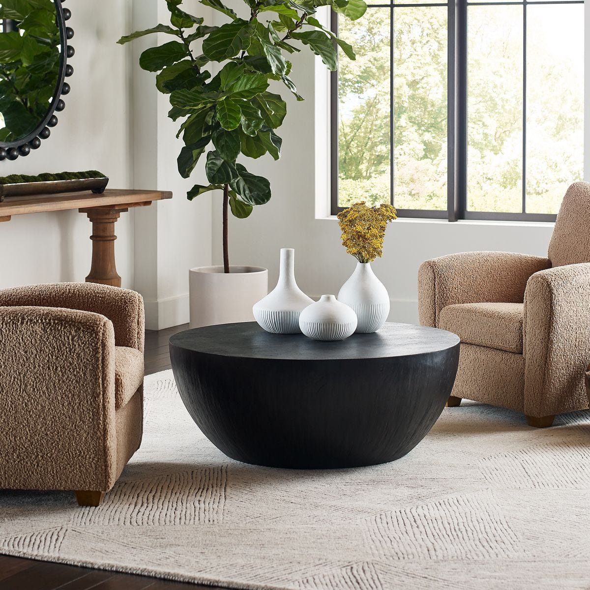 Round mango wood coffee table.
