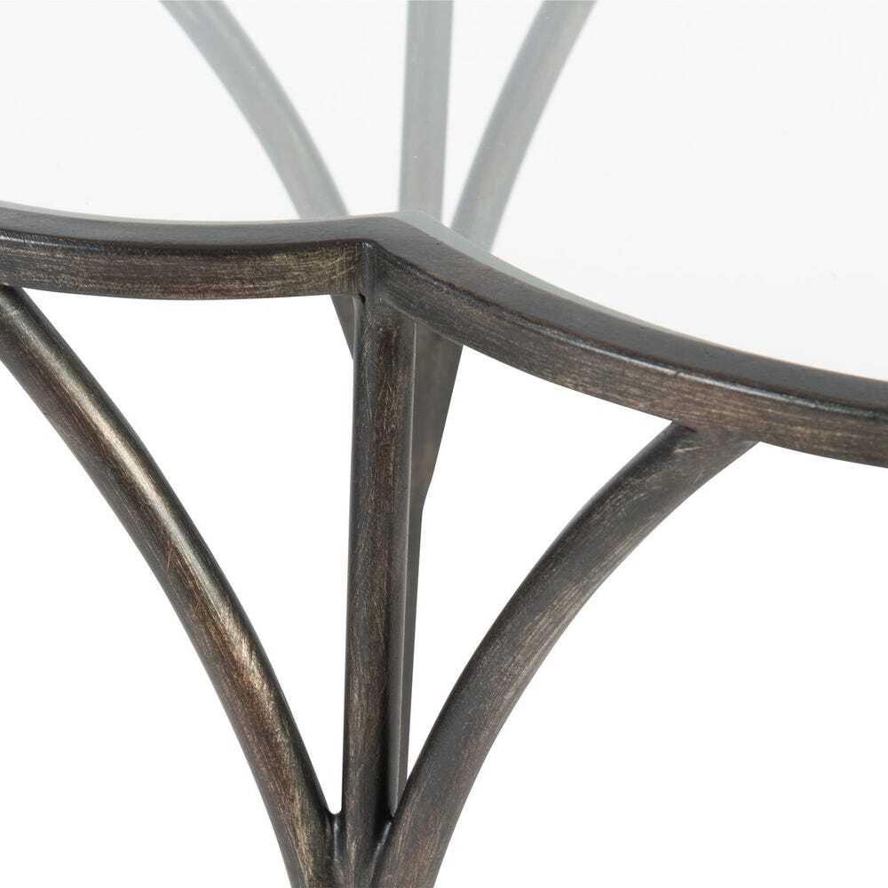 Close-up of a metal chair frame with a white background