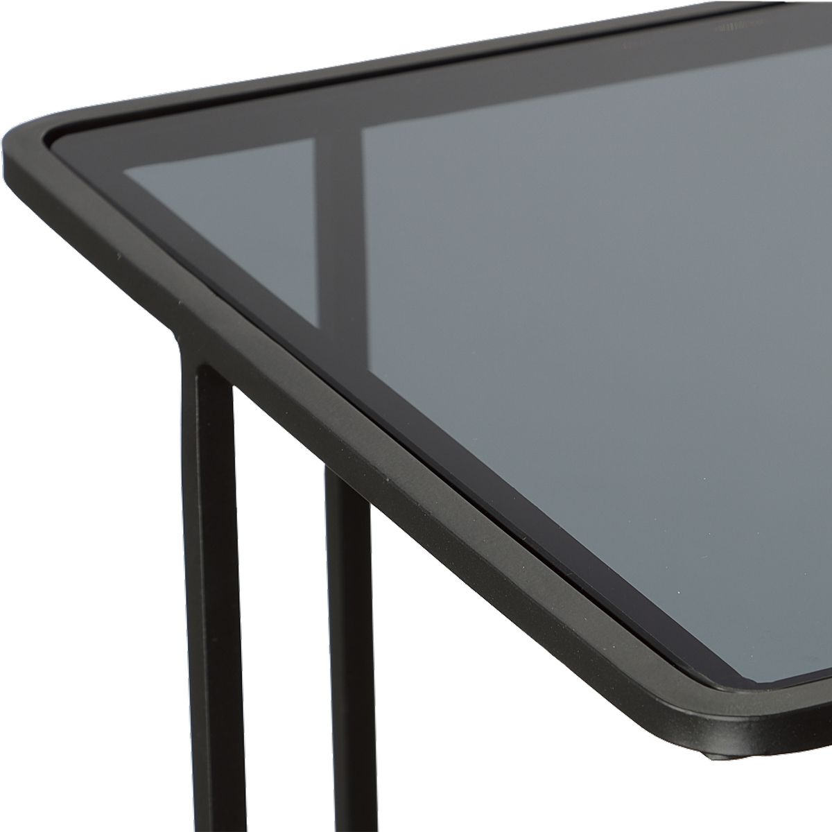 Black metal table with a glass top on a white background