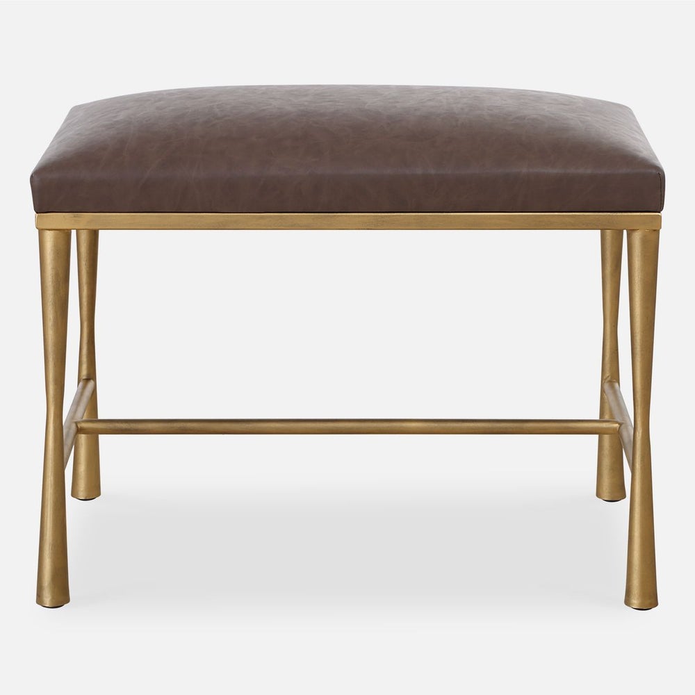 Footrest stool in brown leather.