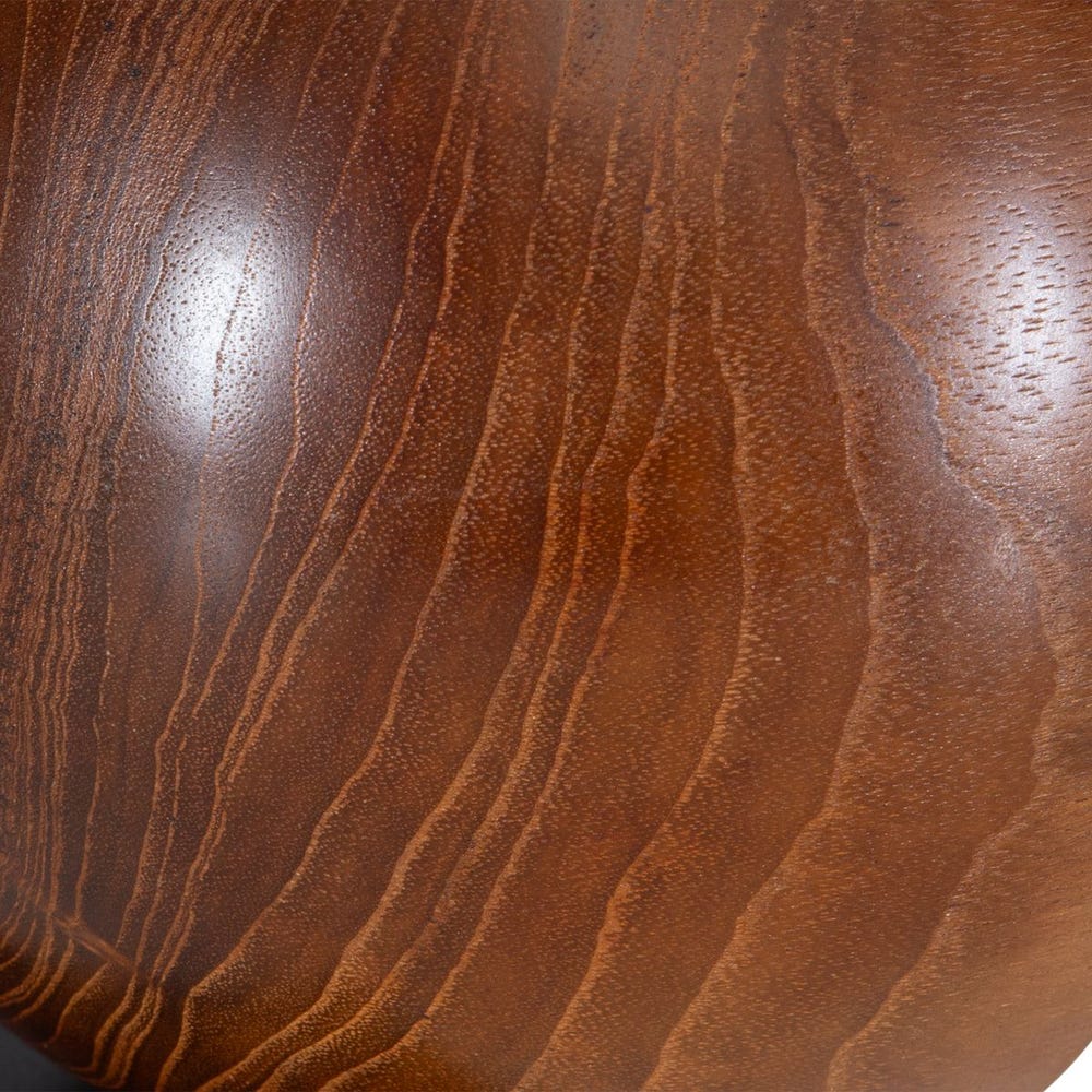 Close-up of wooden surface with visible grain patterns.