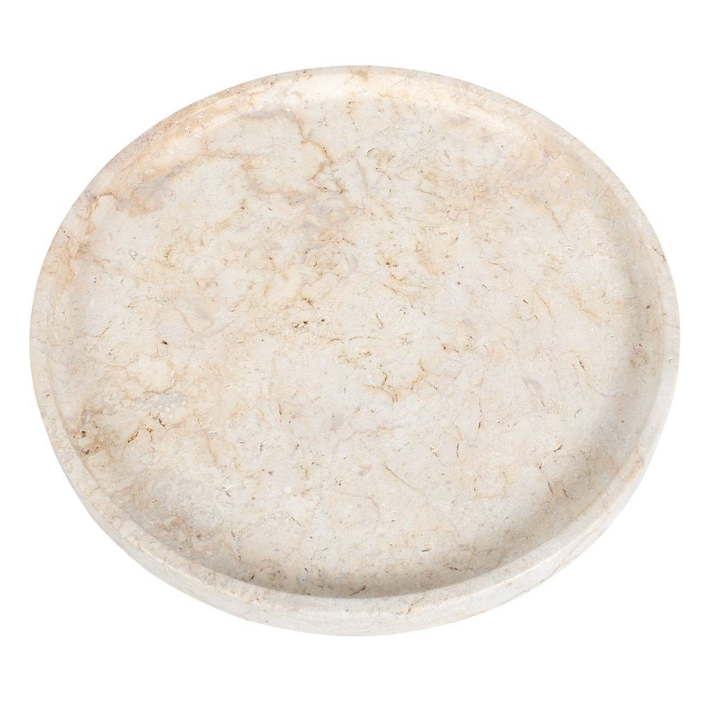 Round beige travertine stone on a white background