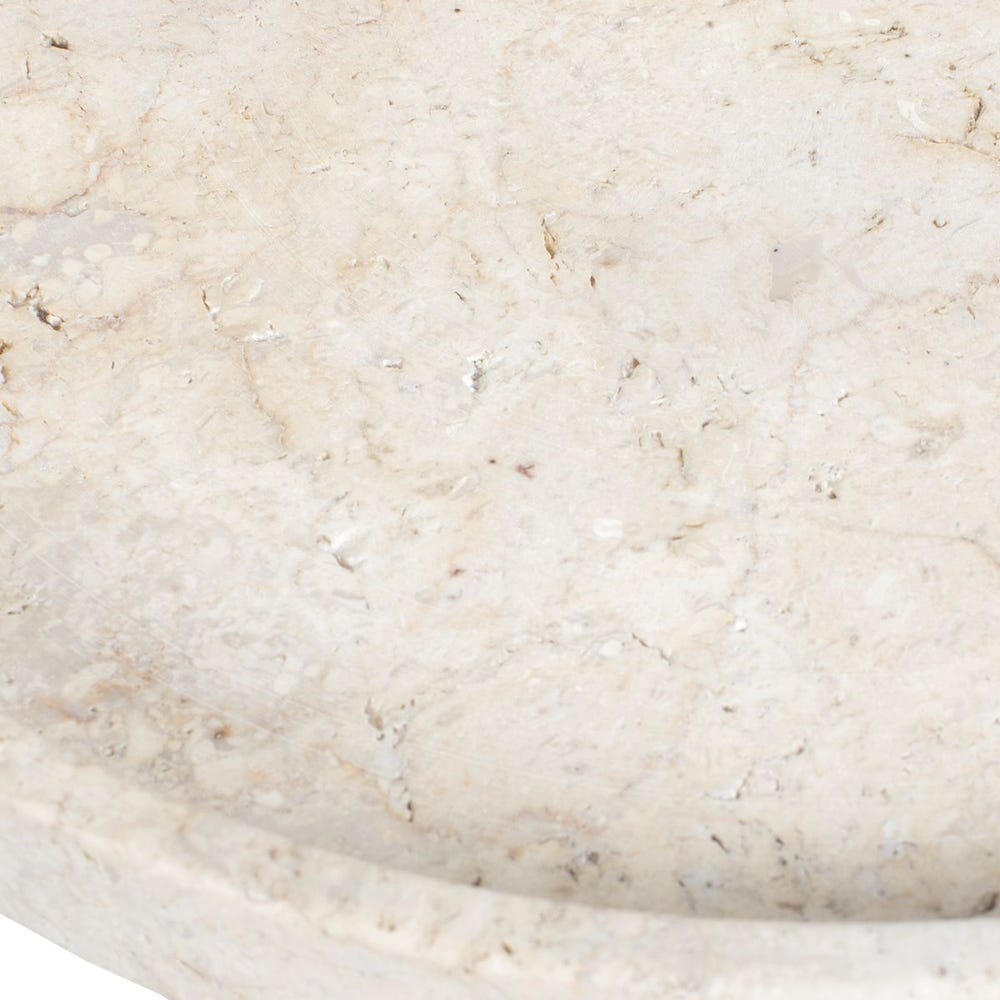 Close-up of travertine marble surface with subtle variations