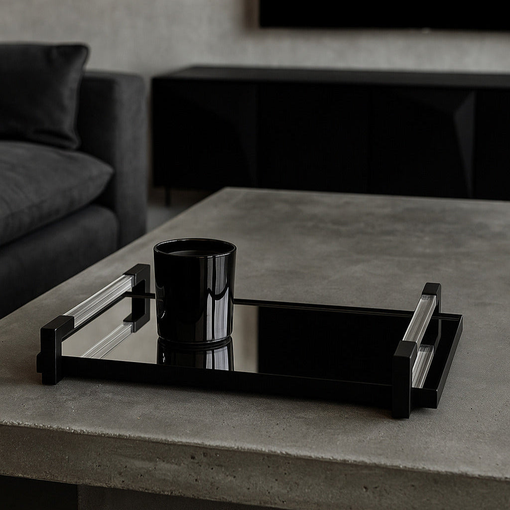 Black tray and cup on a gray coffee table in a living room setting.