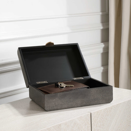 Gray Box Next to Black Sculpture