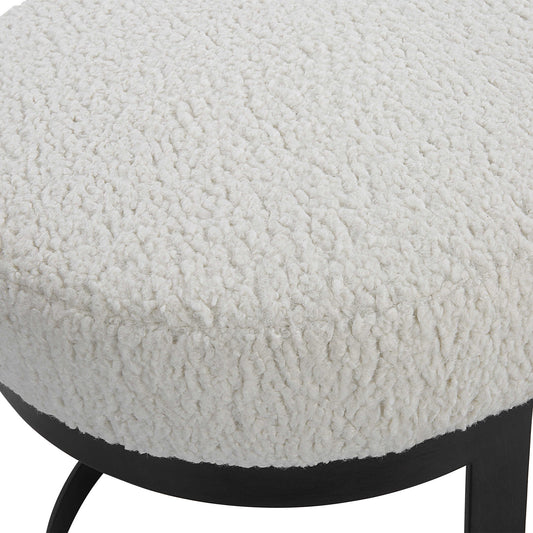 White living room bench with boucle and black metal base.