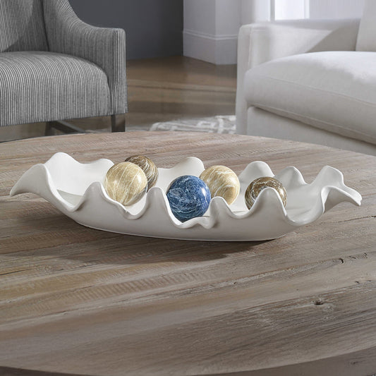 White ceramic tray at an angle.