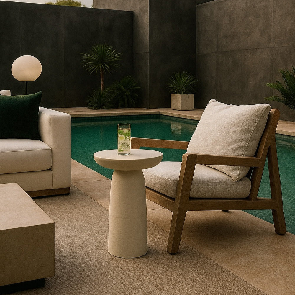 Modern outdoor furniture set by a pool with a neutral color palette.