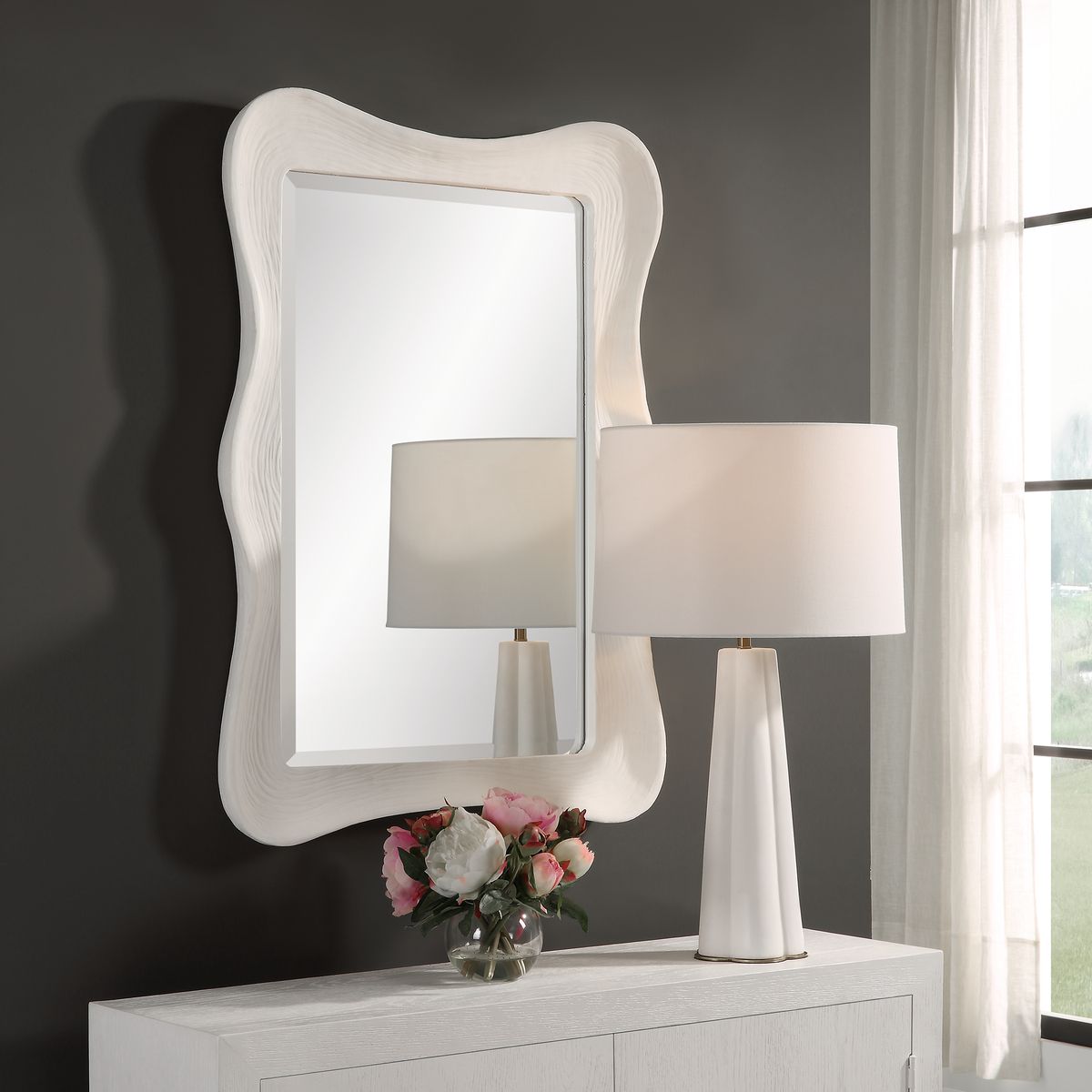 White wavy mirror living room.