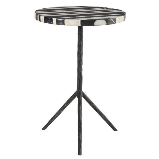 Zebra marble top with scotch on top and glasses next to a classic modern armchair.