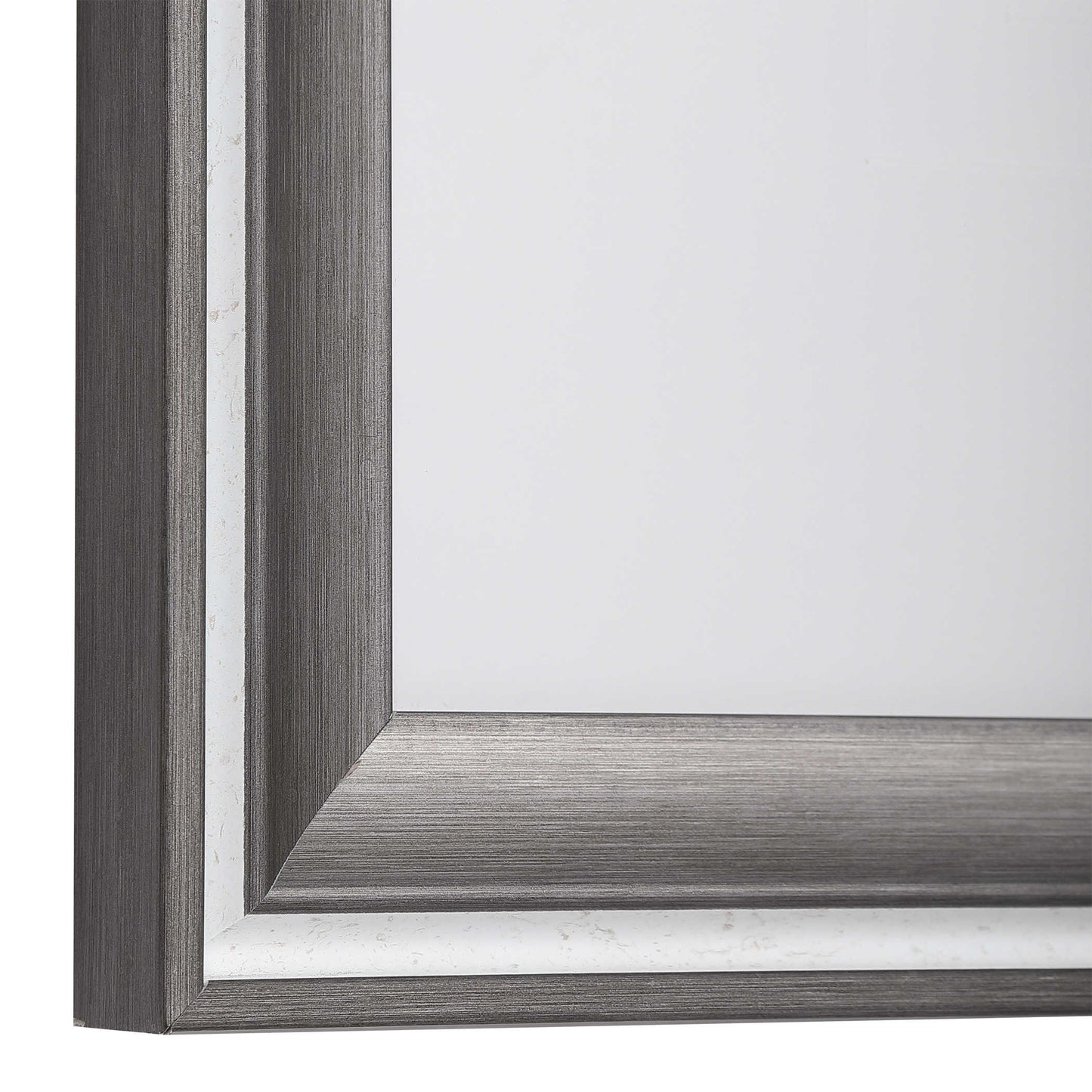 Corner of the piece of art which is a gray wood frame with a white frame inside that with a thicker gray wood frame inside that.