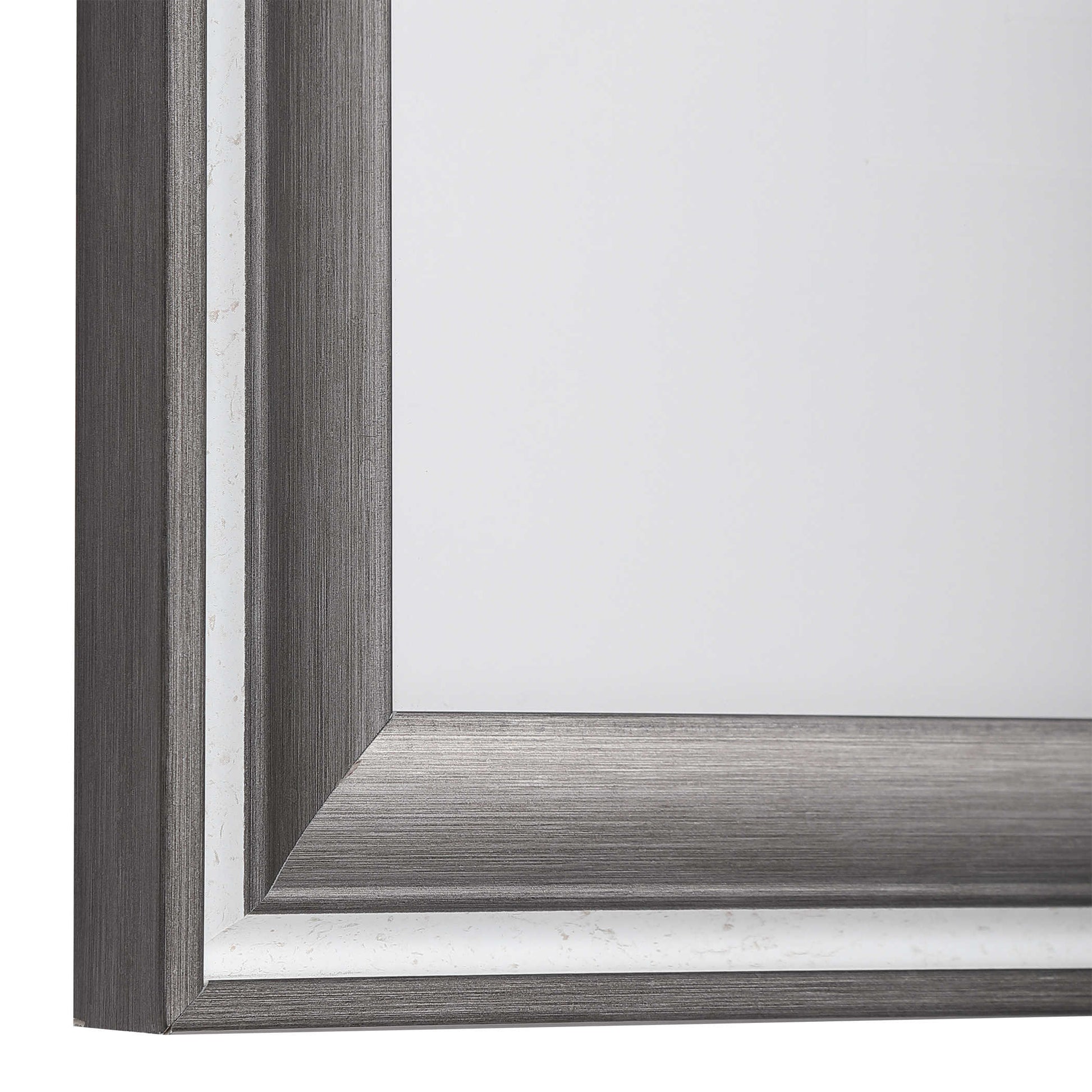 Corner of the piece of art which is a gray wood frame with a white frame inside that with a thicker gray wood frame inside that.