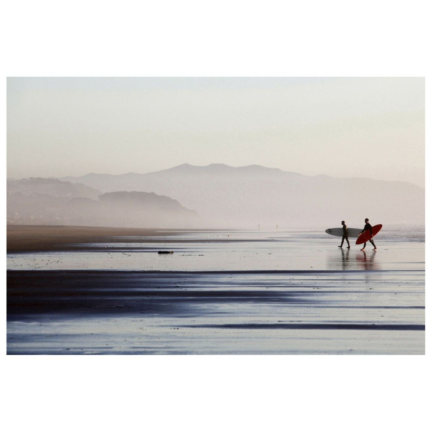 Surfers at ocean