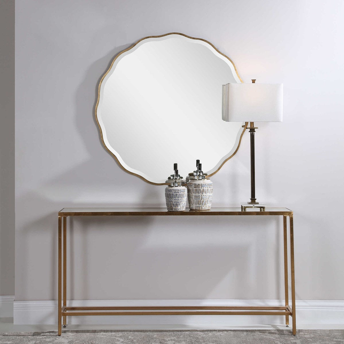 Gold Scalloped Mirror above Console.