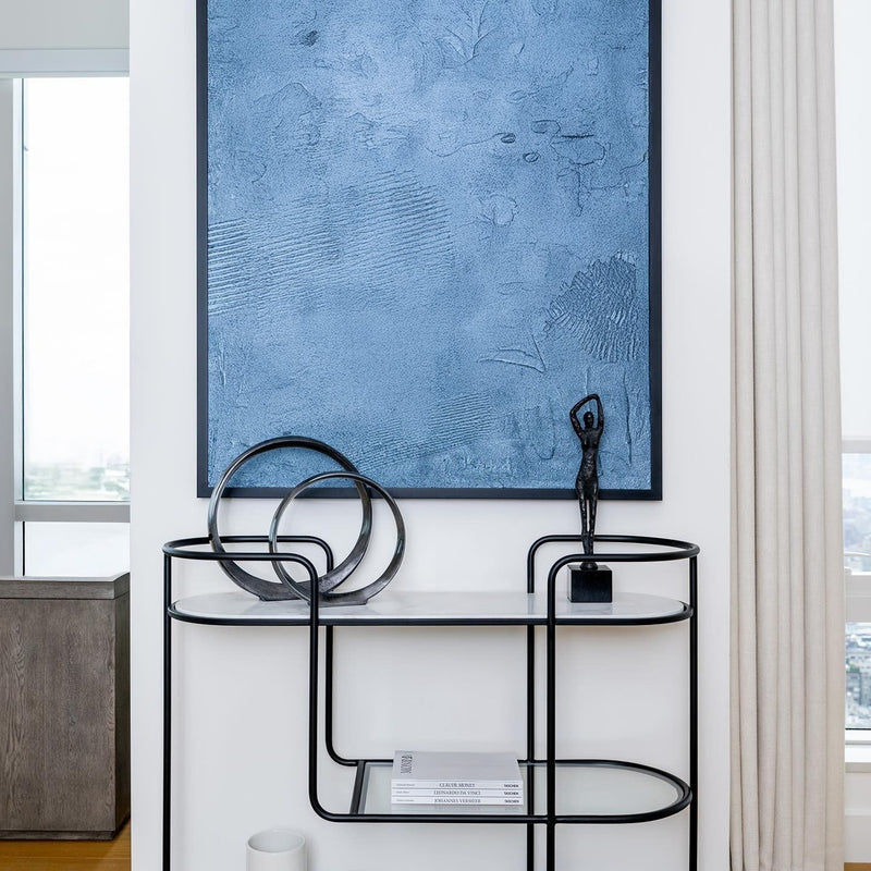 Coastal Entryway Table with Black Decor and abstract Beach Art.