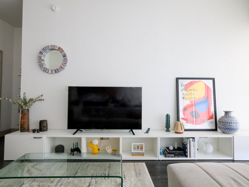 Long low cabinets in white.