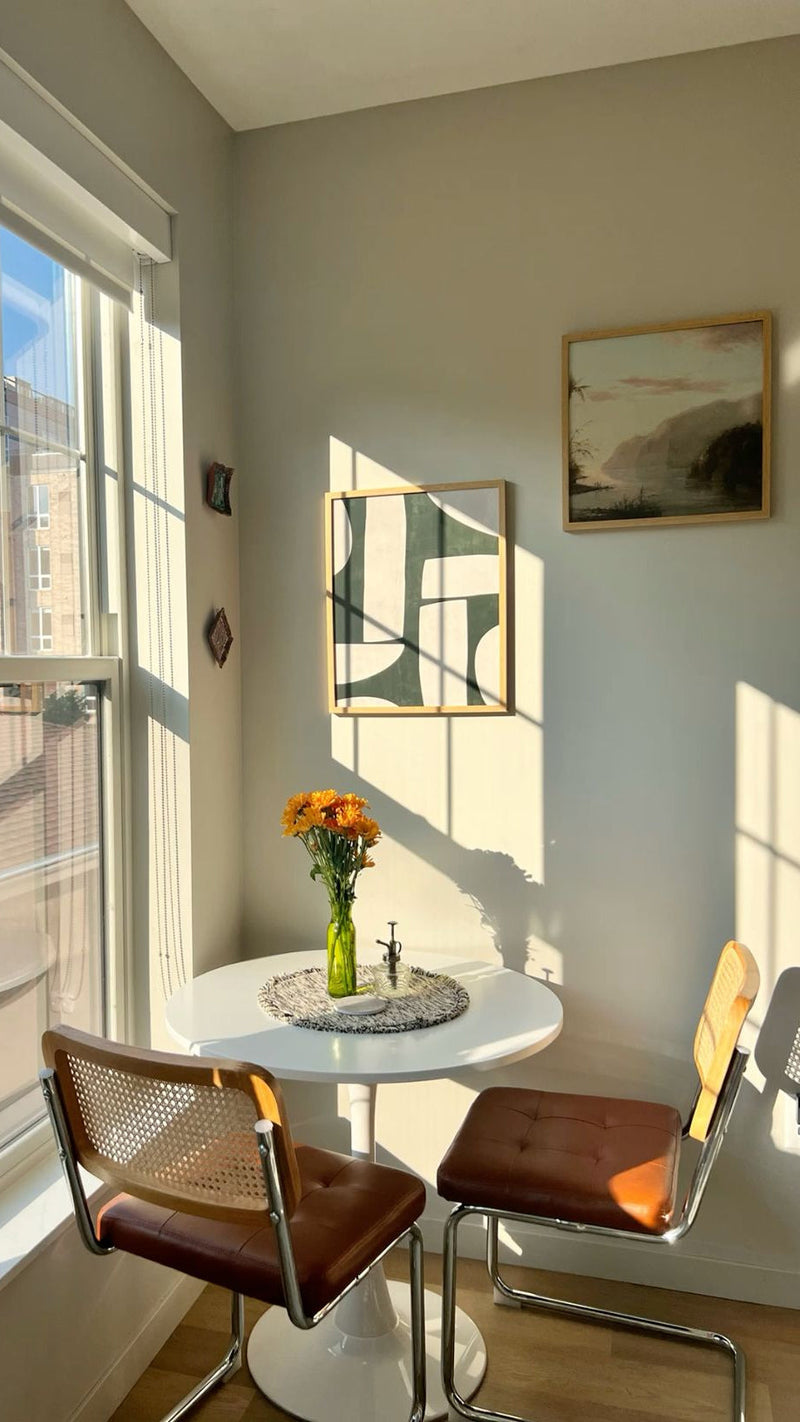 A small dining room by a windows with beautiful sunlight in Brooklyn