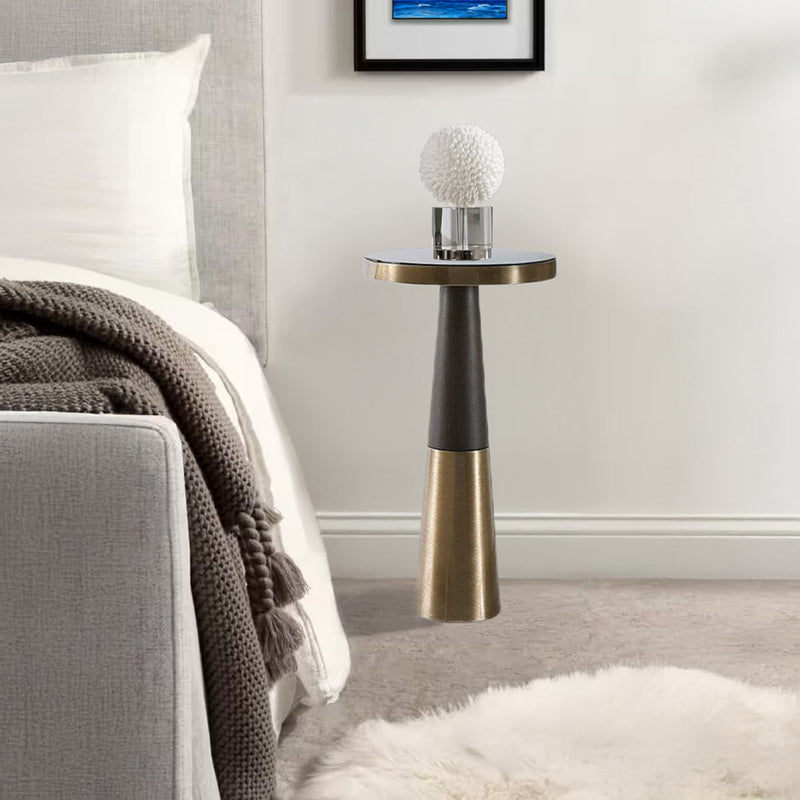 Coastal bedroom with accent table.